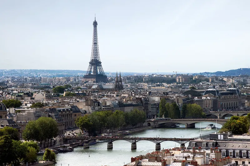 The Eiffel Tower above the rooftops of Paris